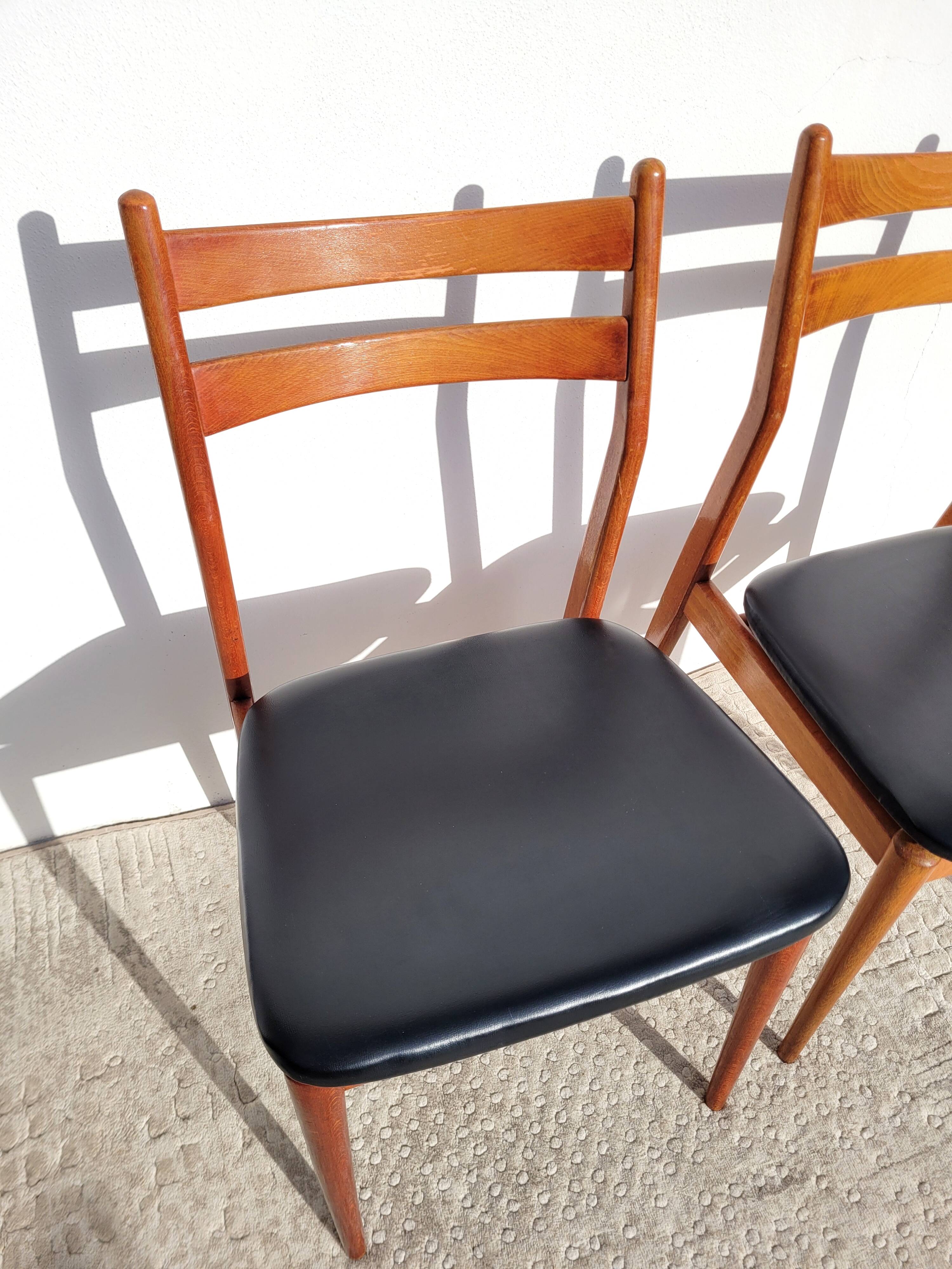 2 Scandinavian wooden chairs