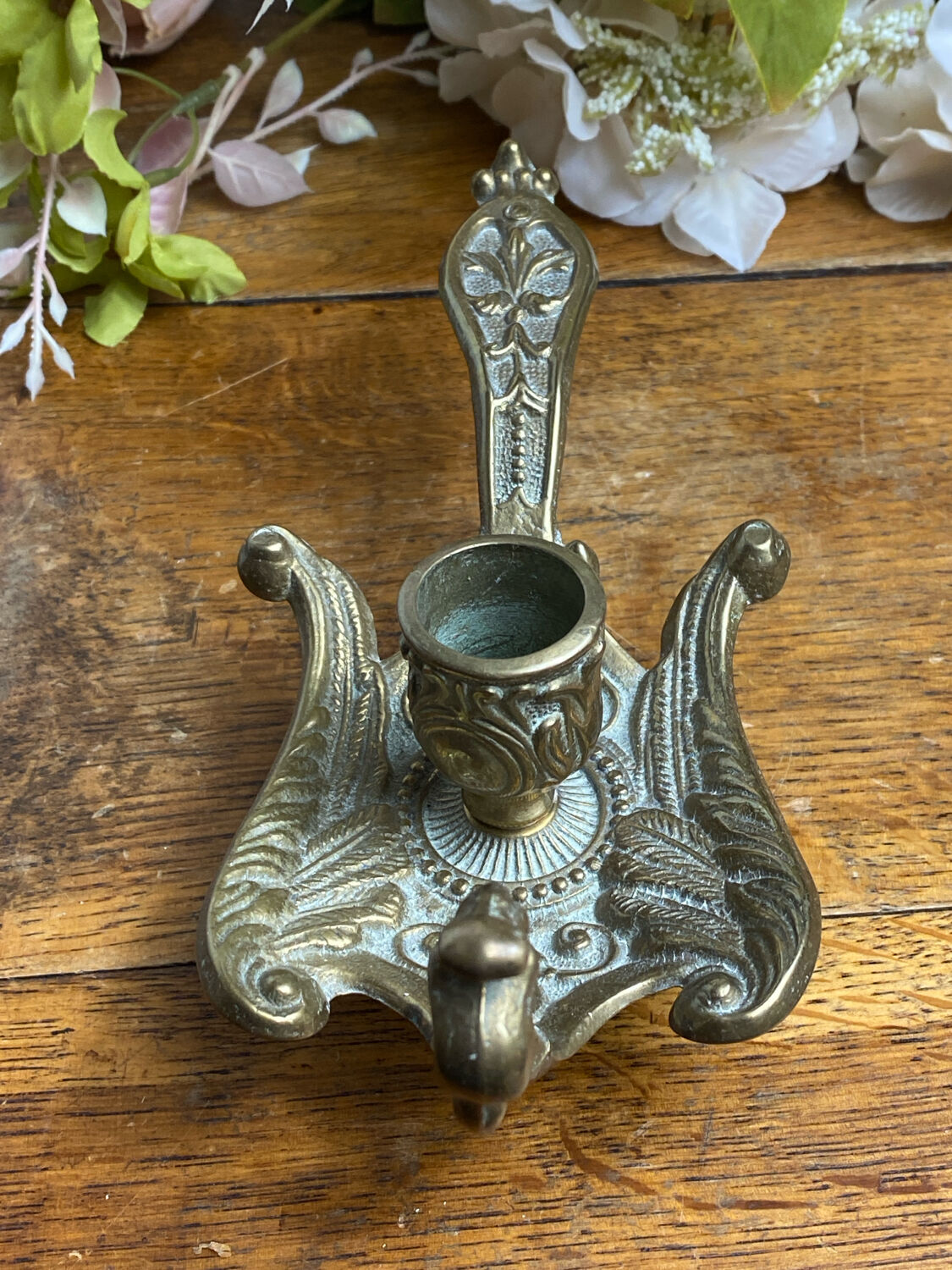 Hand candlestick, peacock shape, in bronze