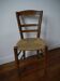 Wooden chair with straw seat