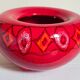 Vintage bright red enamel ceramic tripod vase