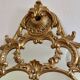 Large gold mirror in Louis XV style