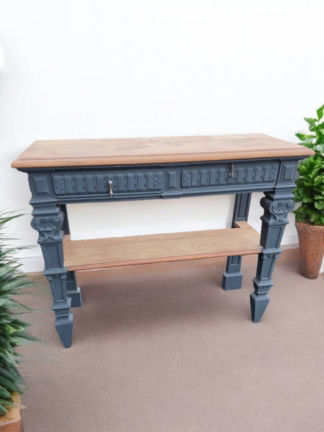 Console in patinated solid oak, late 19th century.