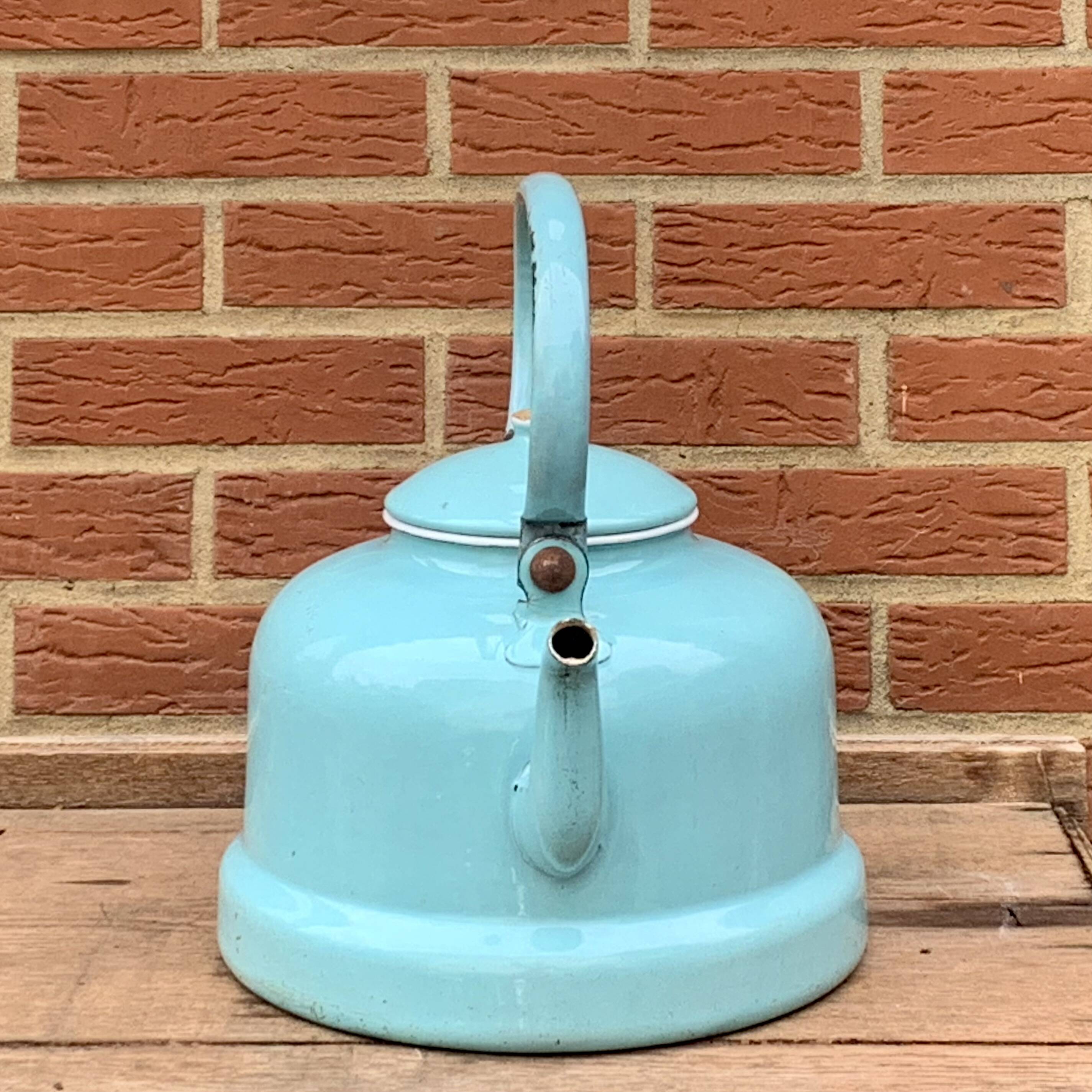 Large vintage kettle in blue enameled sheet metal