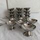 Stainless steel ice cream cups and spoons, 1960s-70s, original boxes.