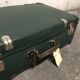 Vintage green case in vulcanized fiber
