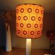 vintage white wood lamp with a seventies graphic flower shade