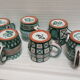 6  mugs with oak stand Robert Picault