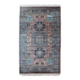 Tapis vintage fait à la main