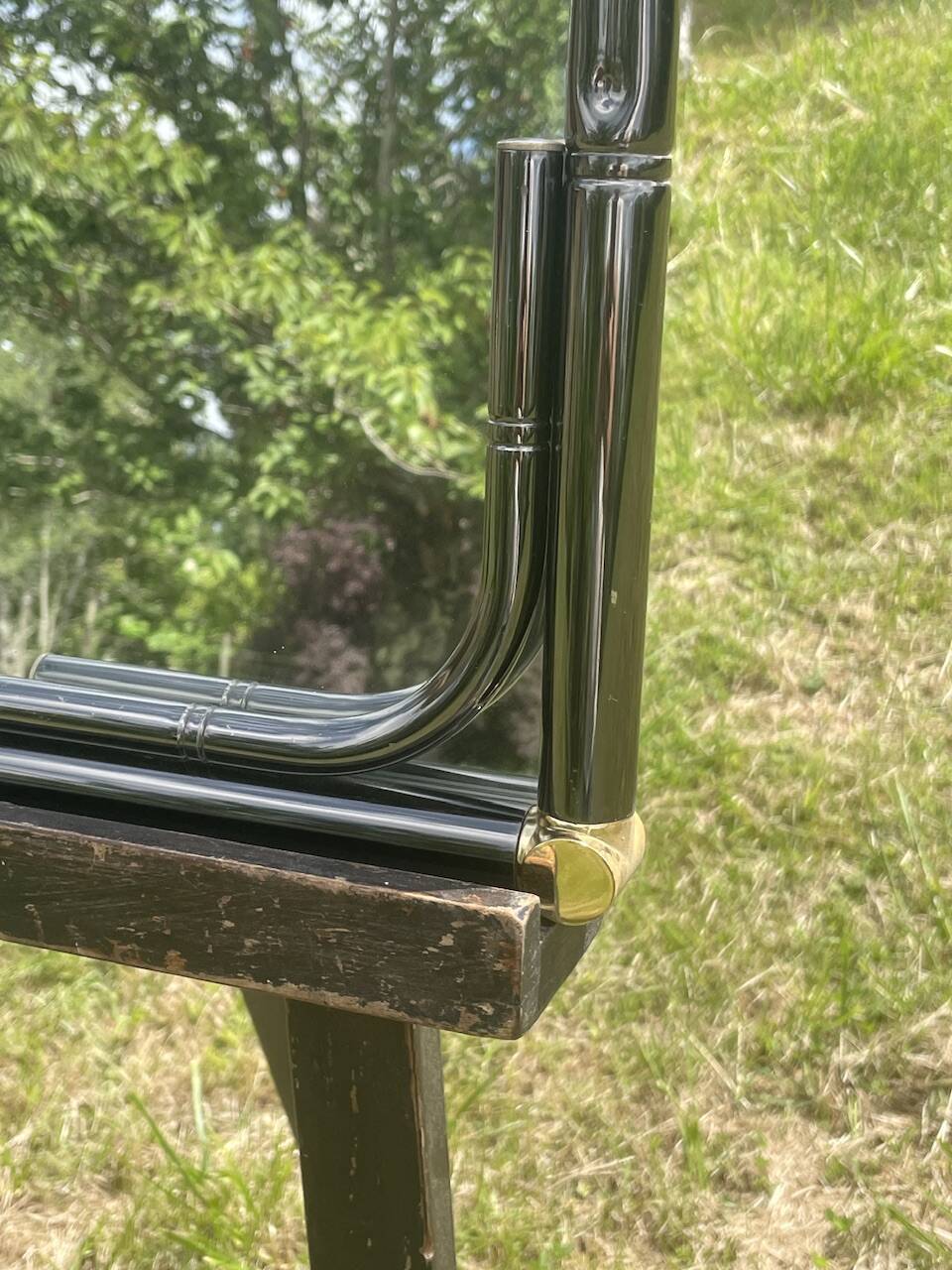 Vintage rectangular wall mirror in tubular metal and brass, 1970s/1980s.