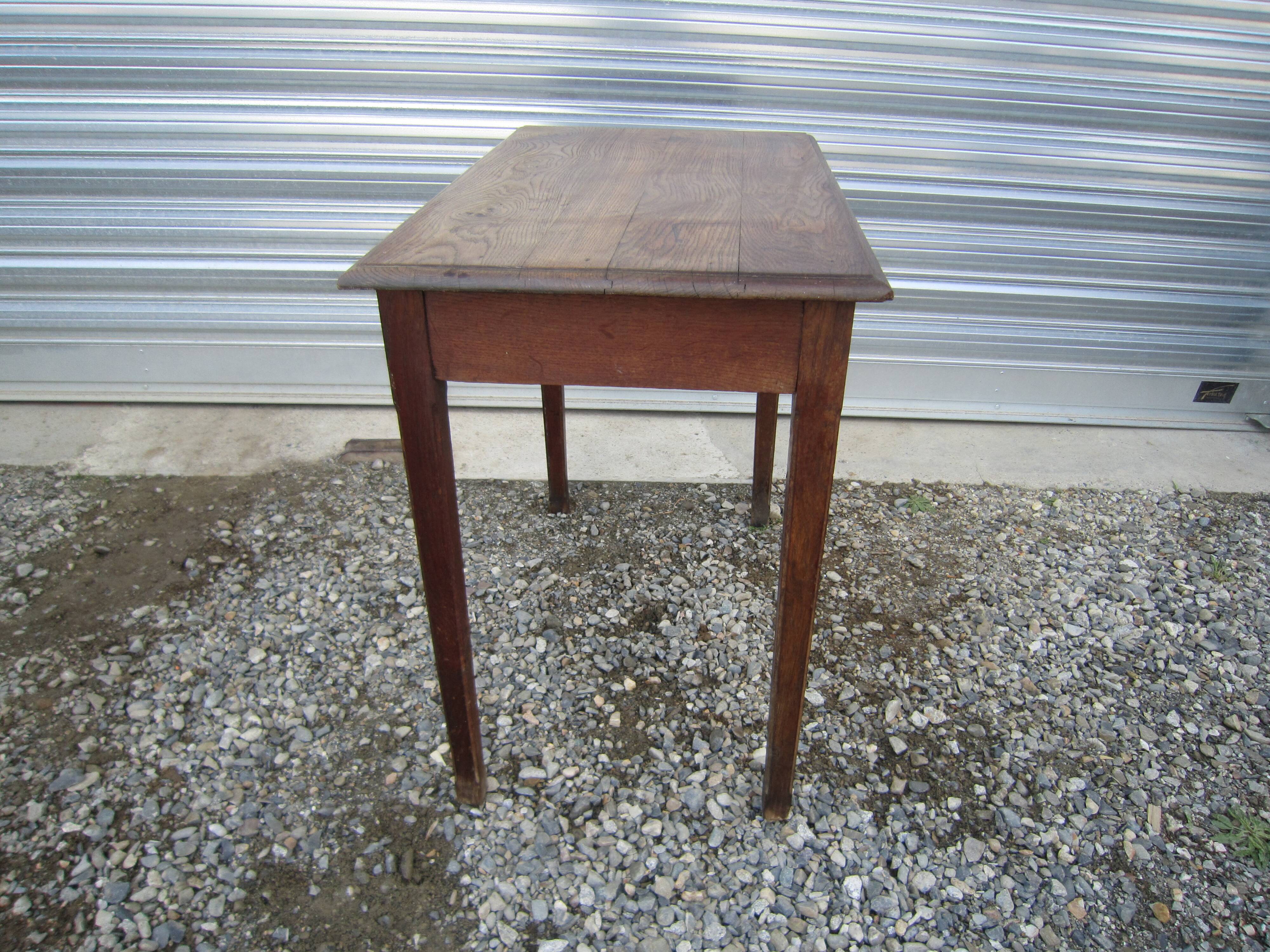 Wooden side table with drawer