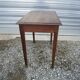 Wooden side table with drawer