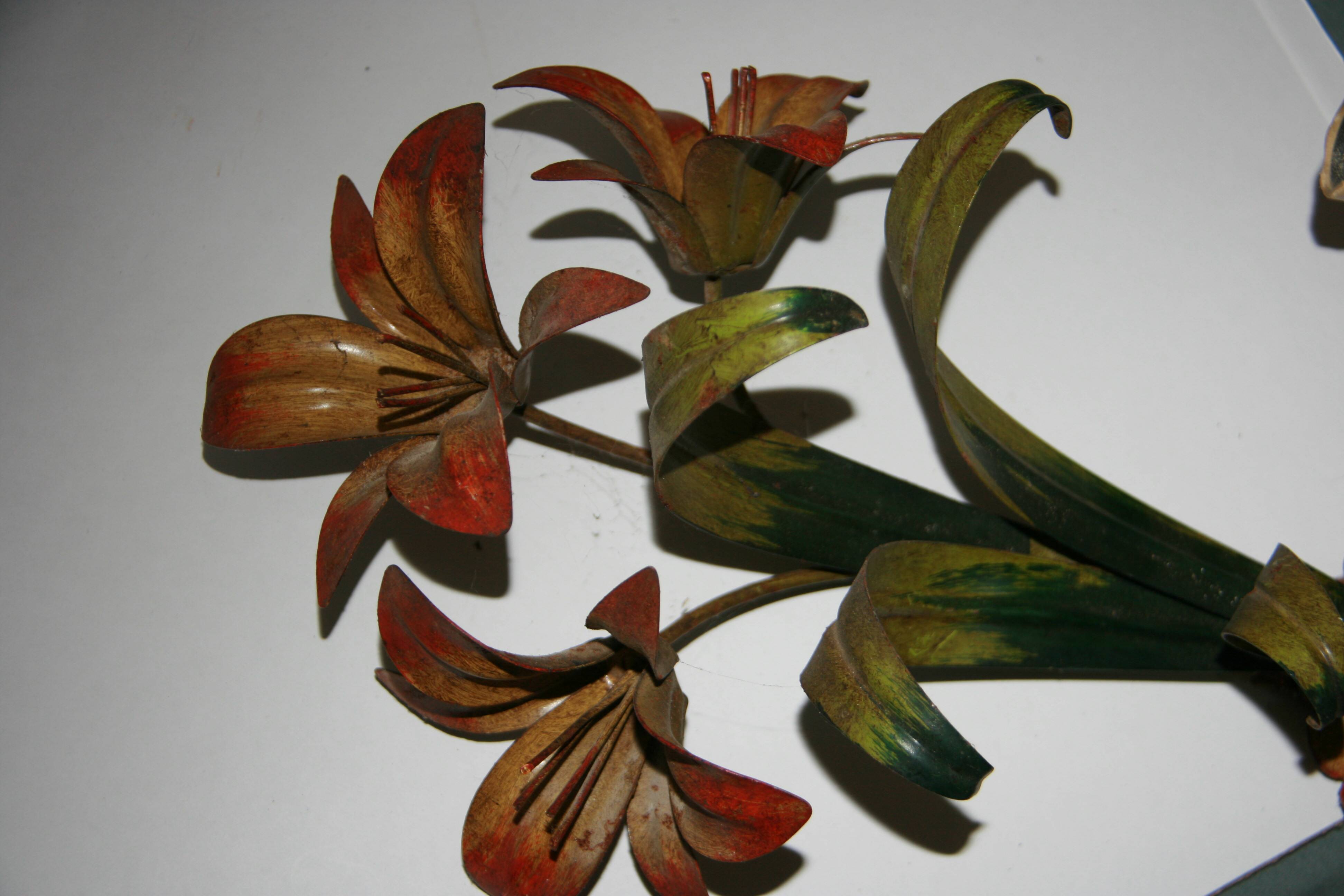 Pair of vintage floral wall sconces in Italian Florentine style metal.