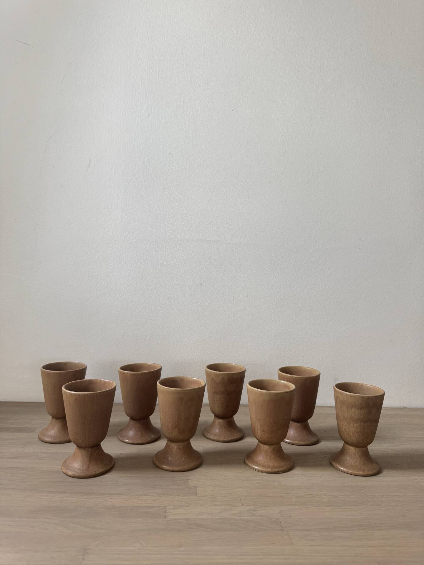 Lot of 8 vintage beige and brown enamelled stoneware mazagrans from the 1970s.