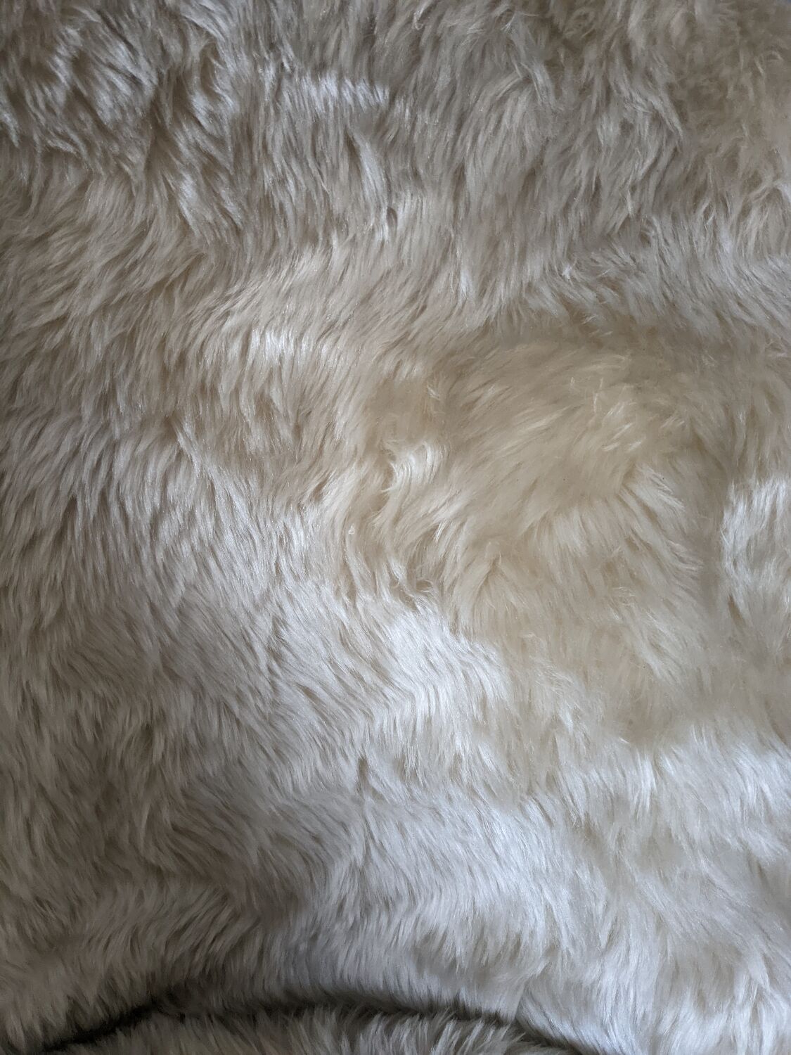 Beige moumoute armchair