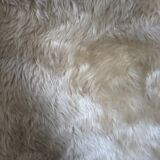 Fauteuil moumoute beige