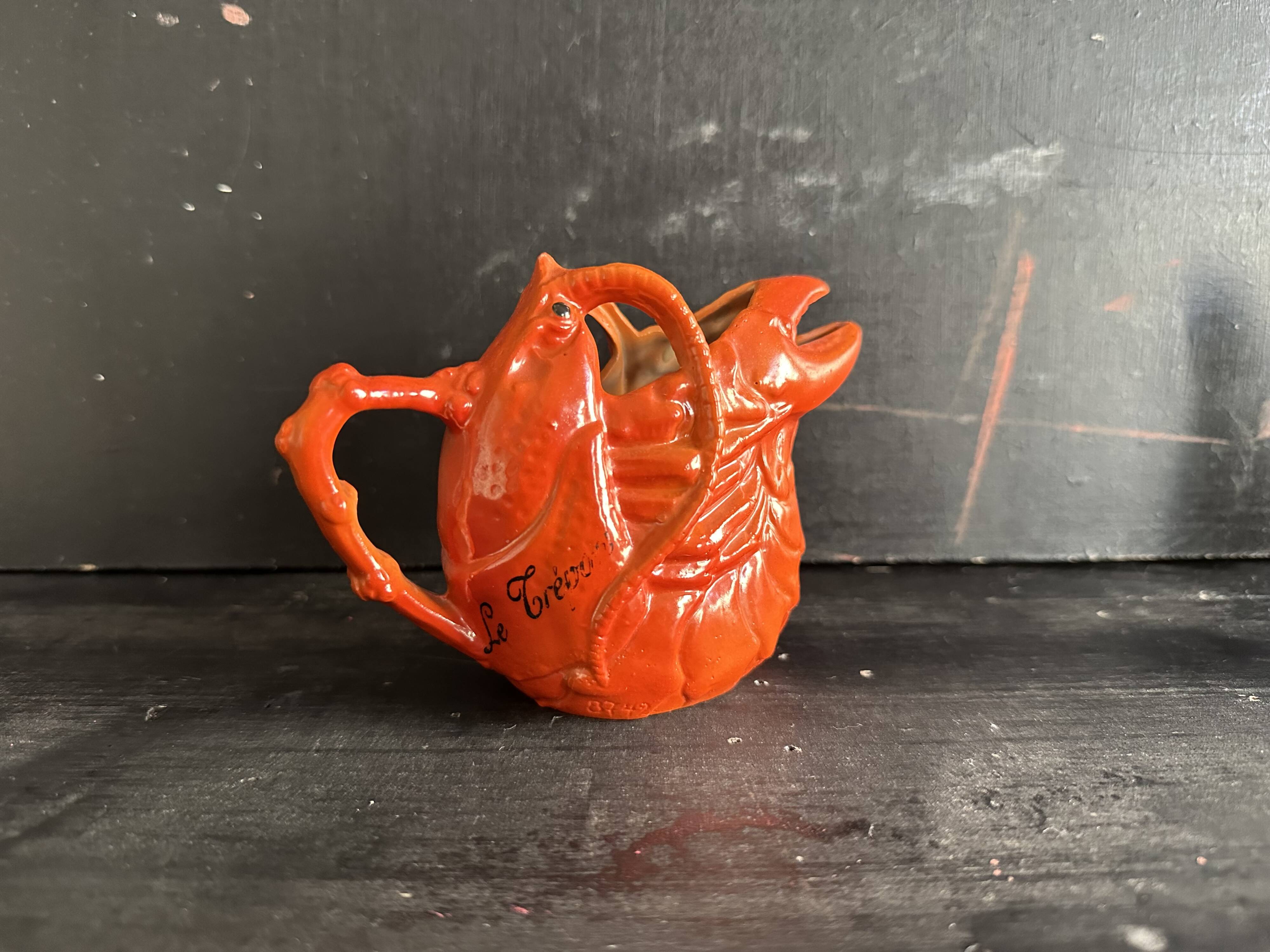 Antique ceramic lobster pitcher from the early 20th century.
