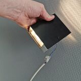 A beautiful up/down wall lamp, designed in Italy in the 1990s.