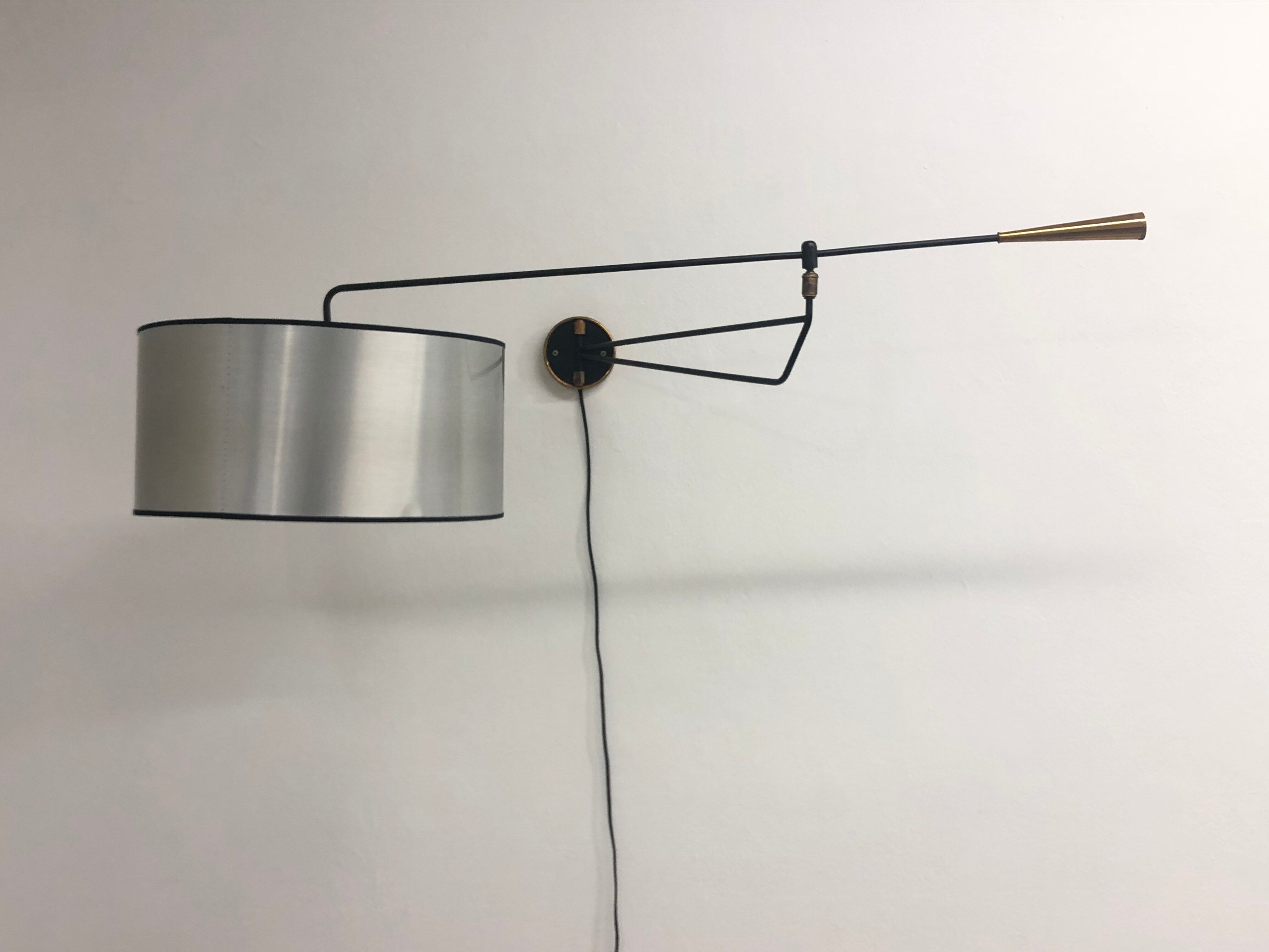 Metal and brass articulated sconce edited by Lunel, 1950s