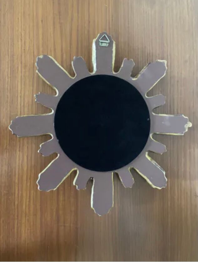 Vintage sun mirror in golden resin 60s/70s