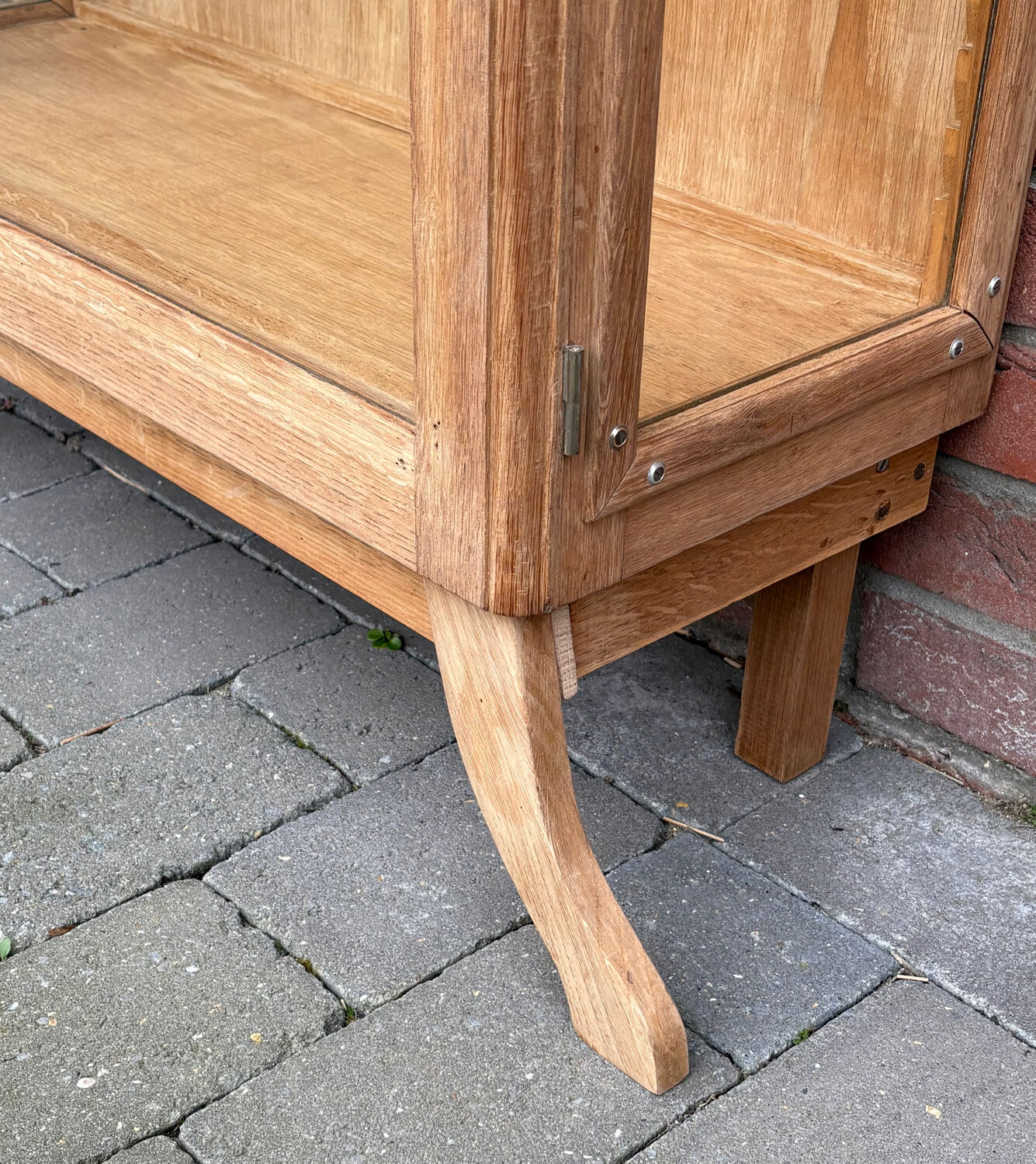 Restored antique oak display cabinet with glass shelves.