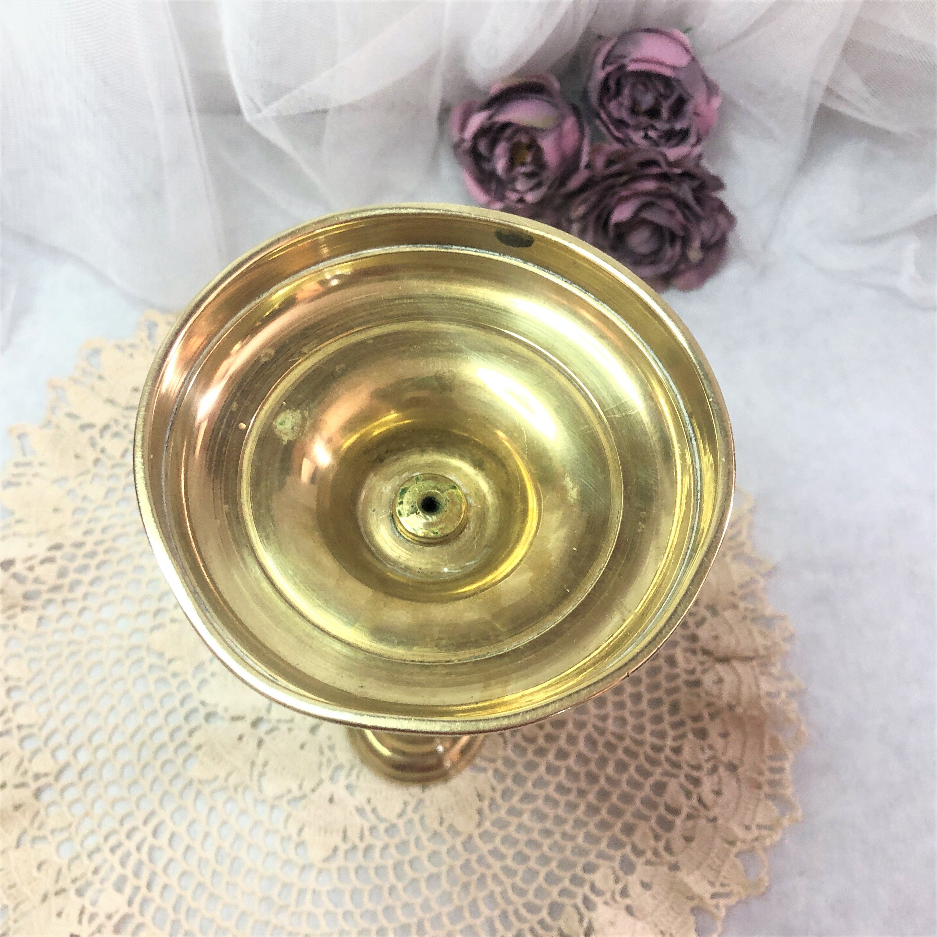 Gilded copper push candle holder