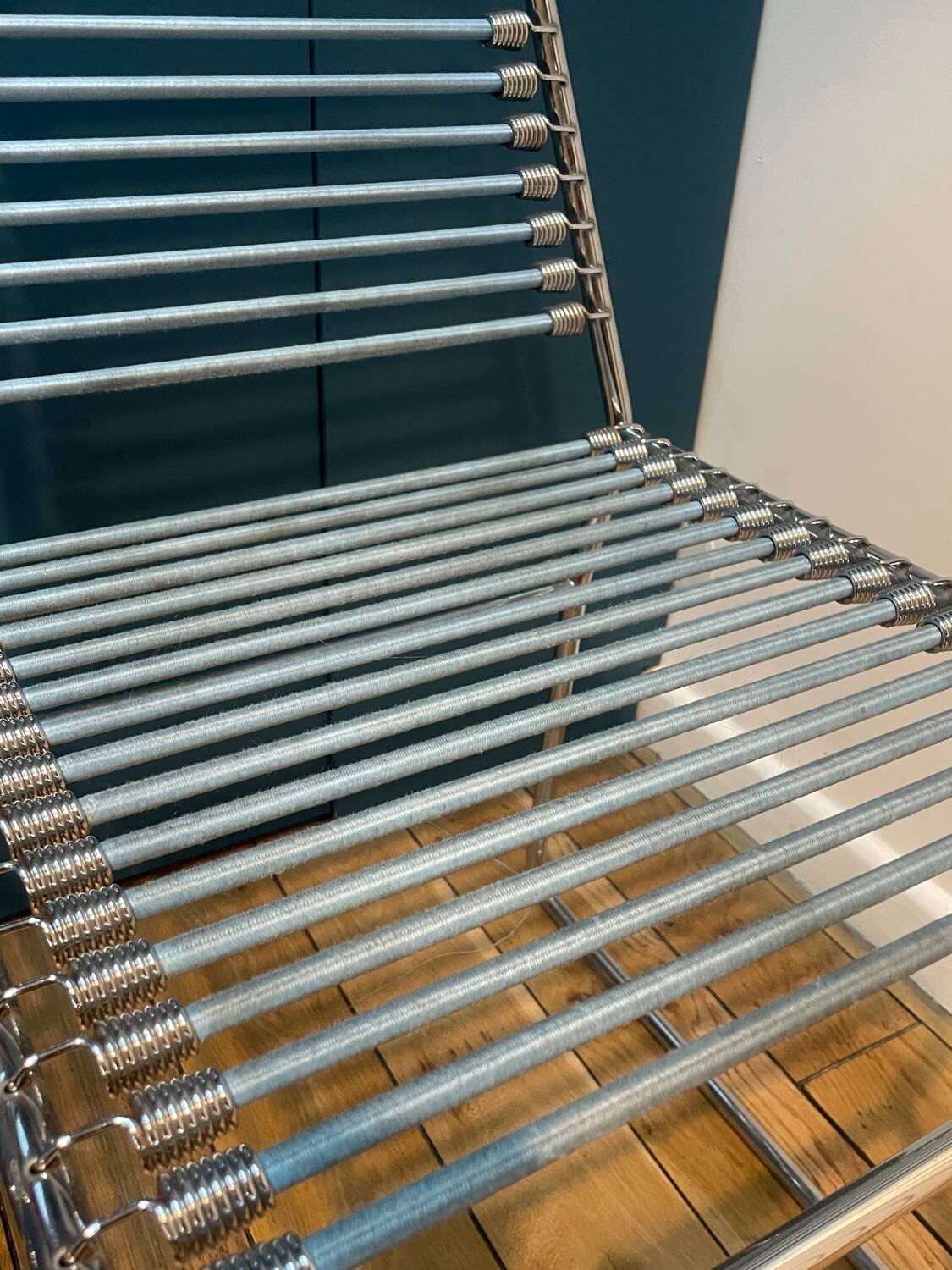 2 metal chairs with bungee cords