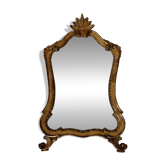 Large Louis XV Courtoisie mirror with a gilded and red patina.