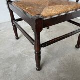 Straw chair by the fireside 1900