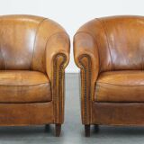 Set of 2 sheep leather club chairs in a cognac color