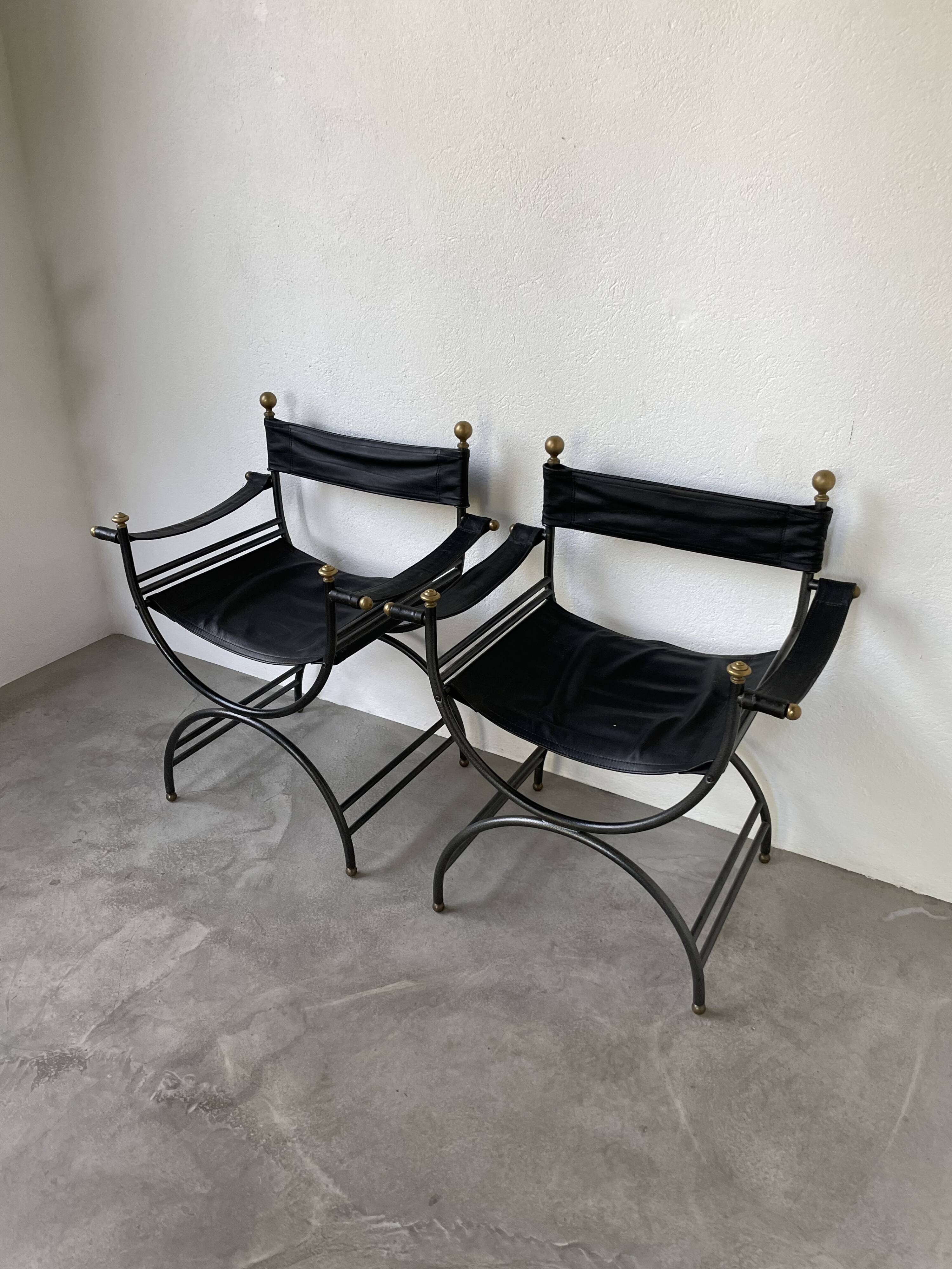 Pair of leather “curule” emperor armchairs