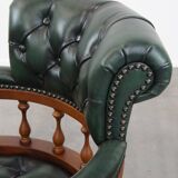 Dark green chesterfield office chair in cowhide leather on wheels