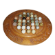 Ancient solitaire game in wood and stone marbles