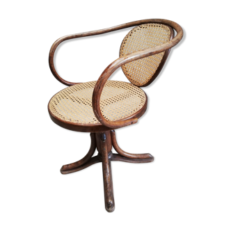 Office chair with curved wood swivel screw and Thonet cannage