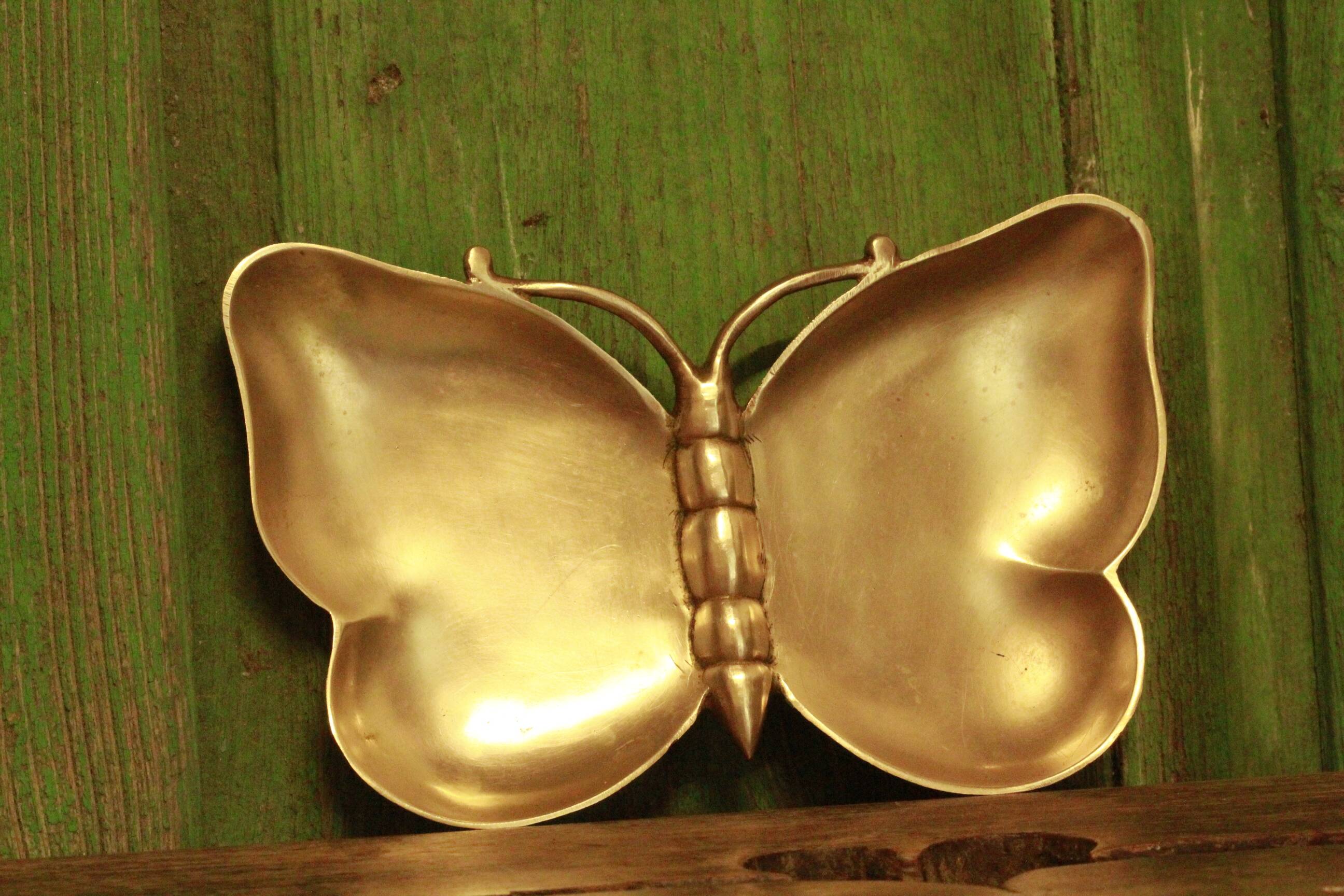 Brass butterfly tidy