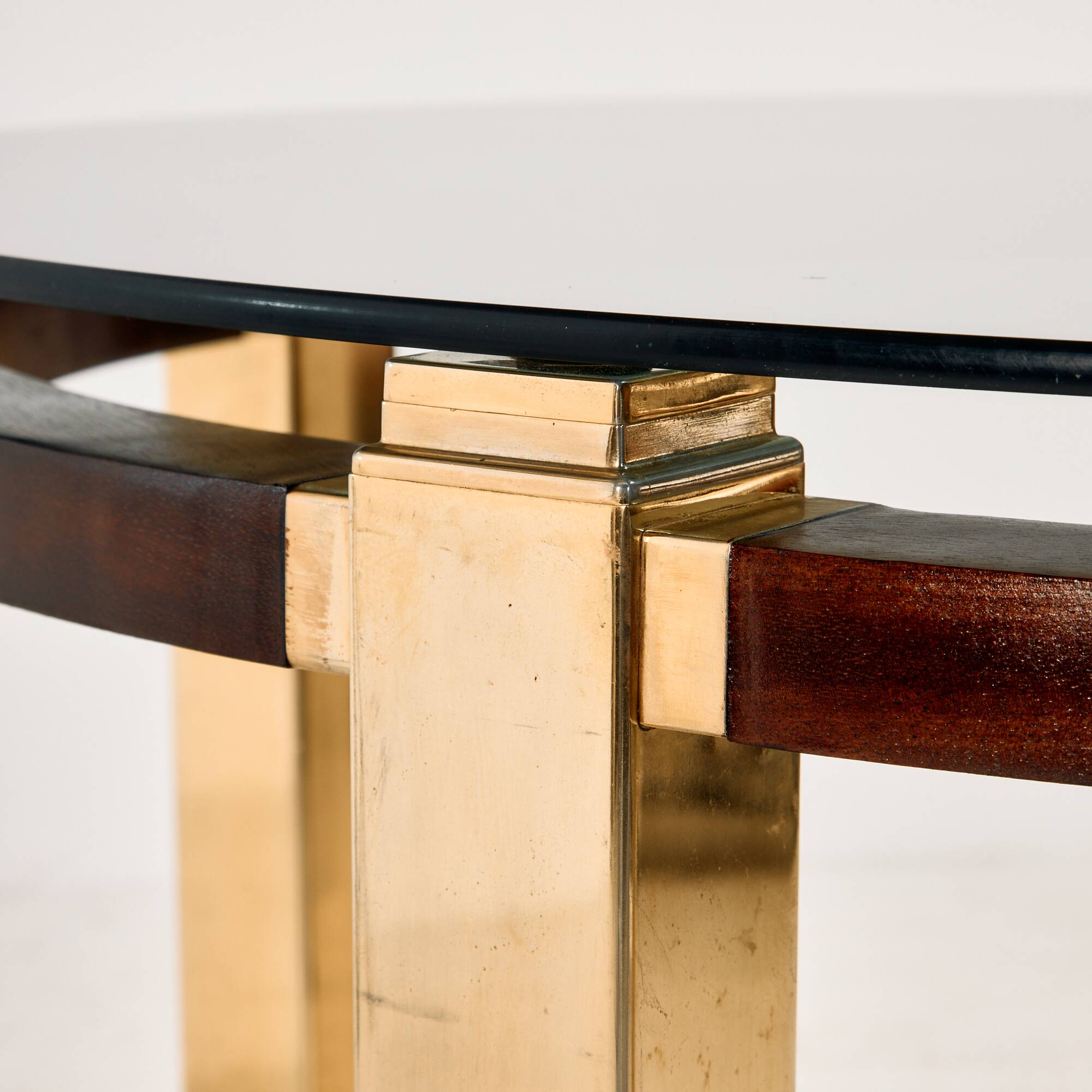 Restored dining table in mahogany and brass.