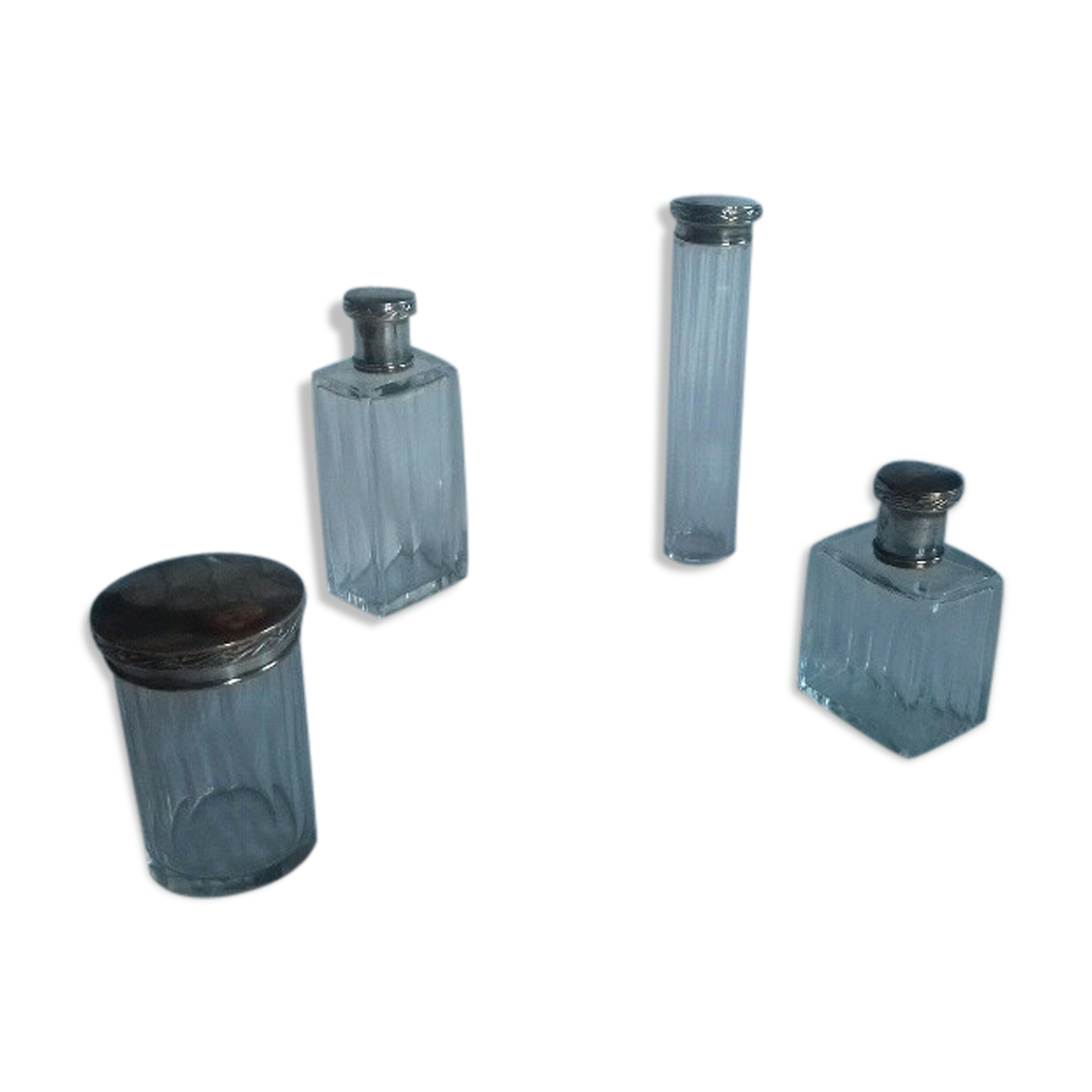 Lot of 4 glass toilet bottles, silver metal caps