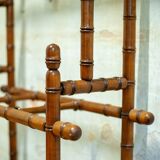Coat rack with mirror and umbrella stand in faux bamboo, 1950s.