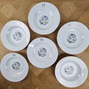6 deep plates made of Limoges porcelain with a paradise bird design.