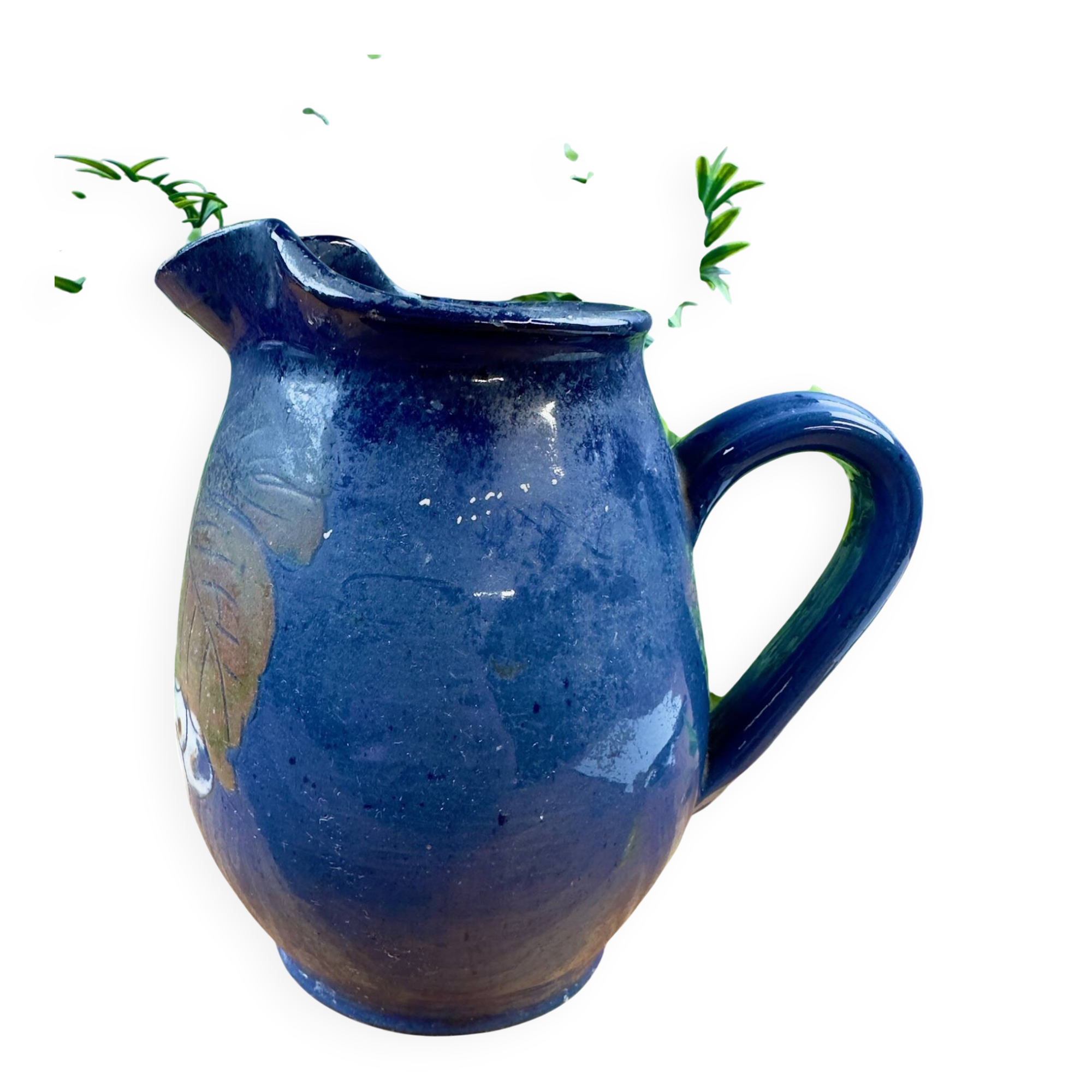 Blue ceramic pitcher with vintage artisan inscription decoration.