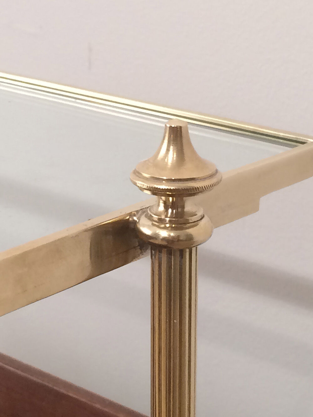 Neoclassical magazine rack in mahogany and brass