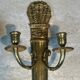 Pair of Empire style bronze wall sconces with quiver design.