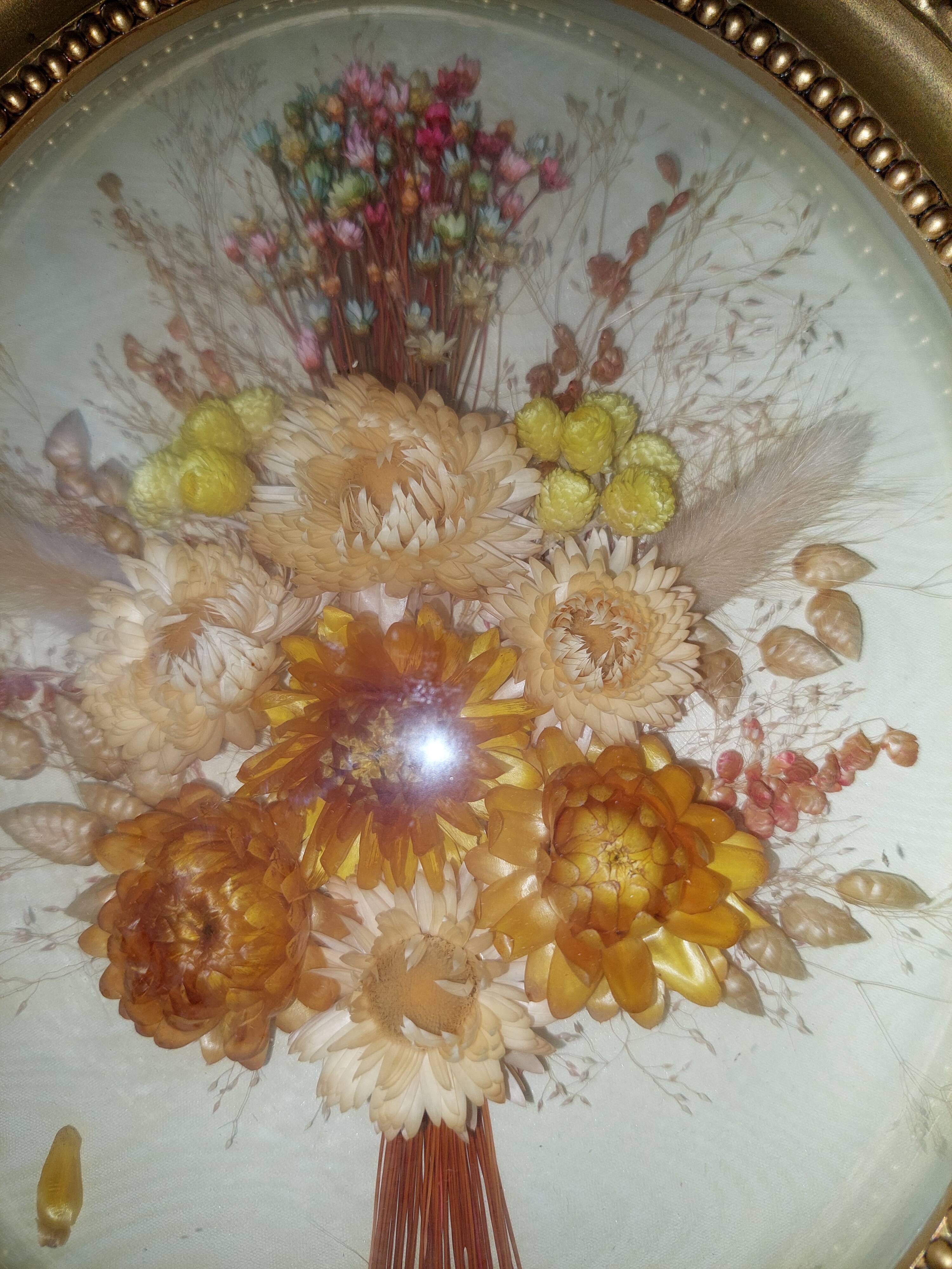 Oval frame domed dried flowers occasion