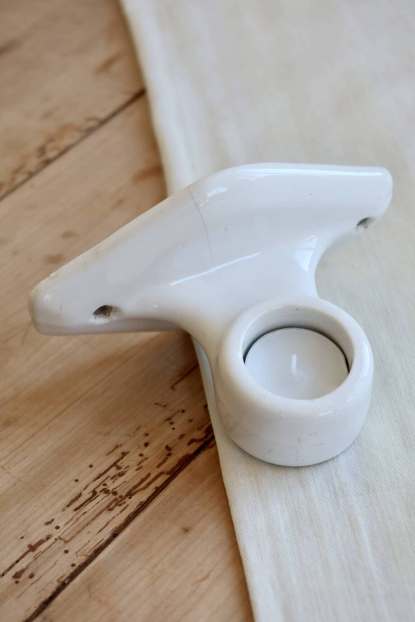 Antique wall candle holder in white porcelain