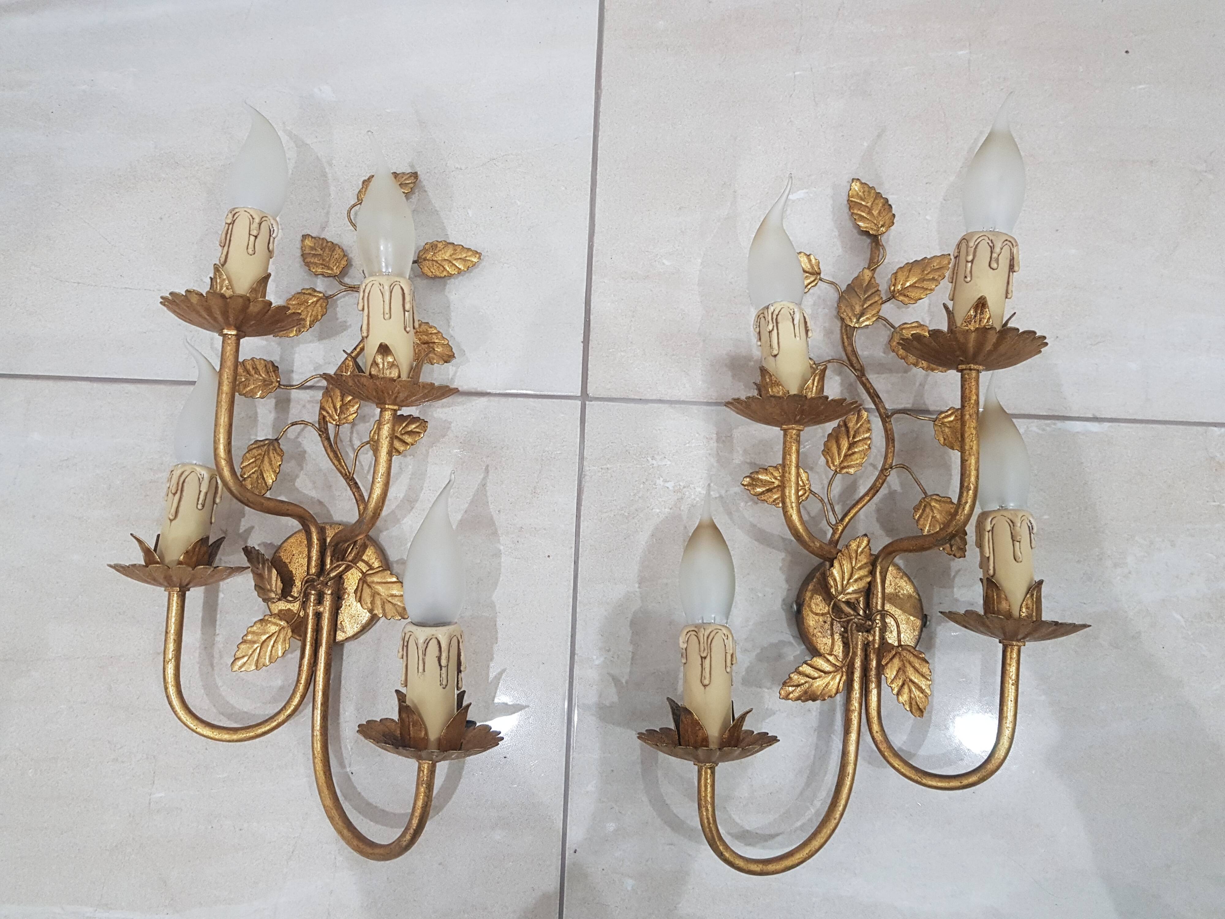 A pair of wall lamps / Coco Chanel / Hollywood Regency / France, 1960s