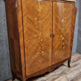 Curved Louis XV style armoire with floral marquetry, 20th century period.