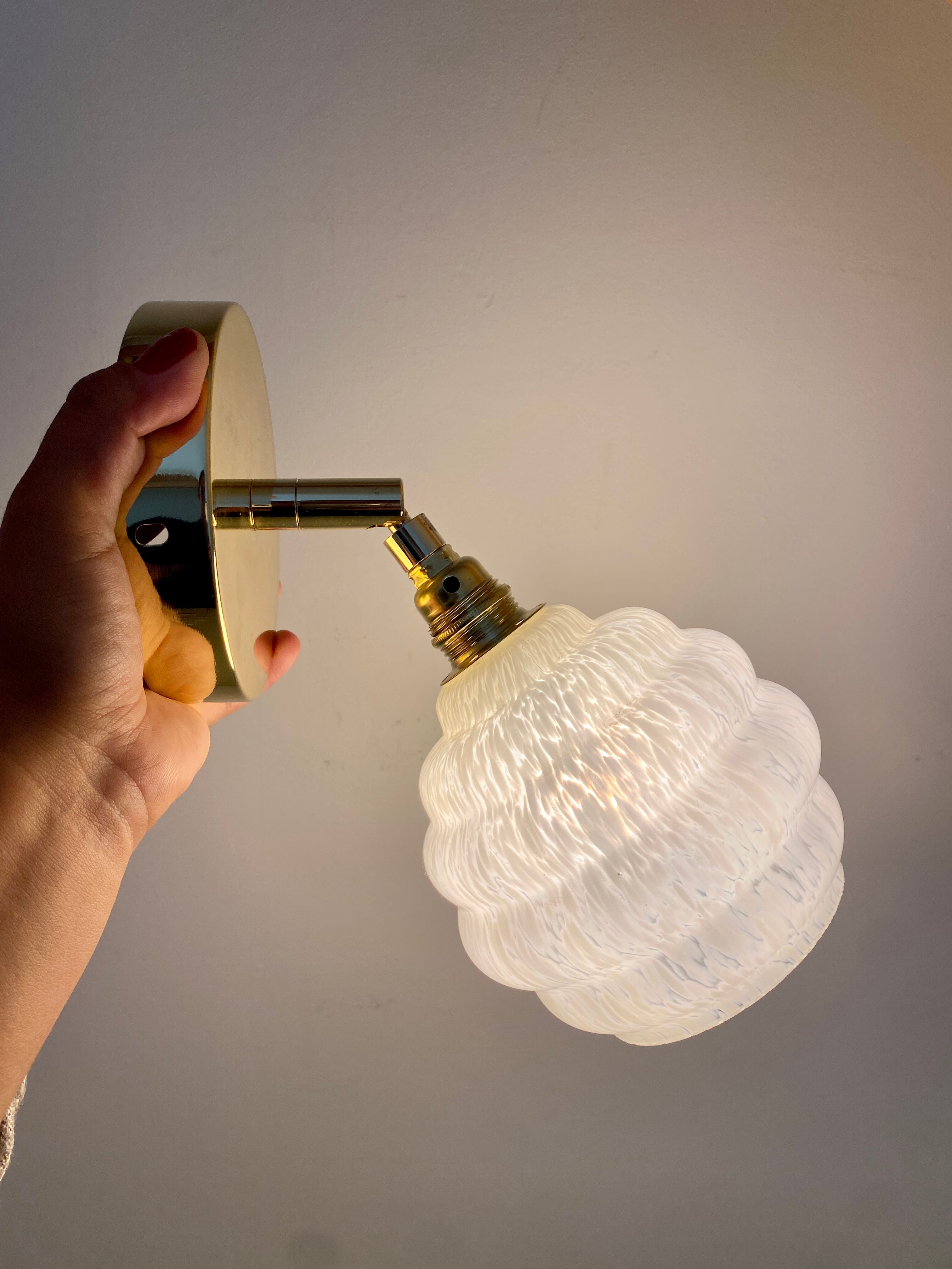 Vintage globe wall lamp in white clichy glass