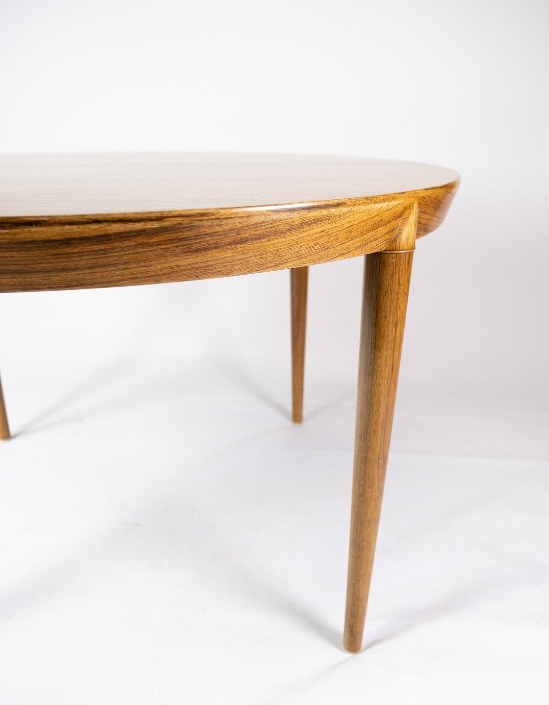 Dining table in rosewood of danish design from the 1960s.