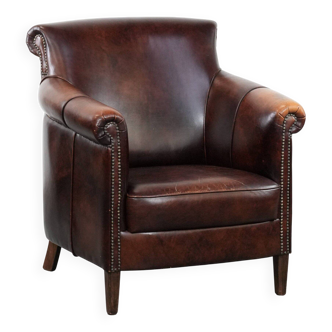 Characterful and comfortable cowhide leather armchair