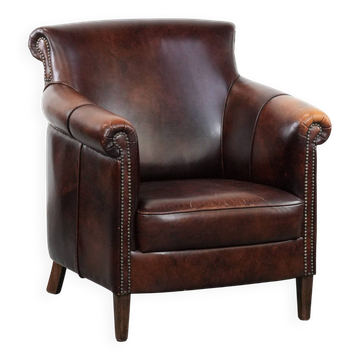 Characterful and comfortable cowhide leather armchair