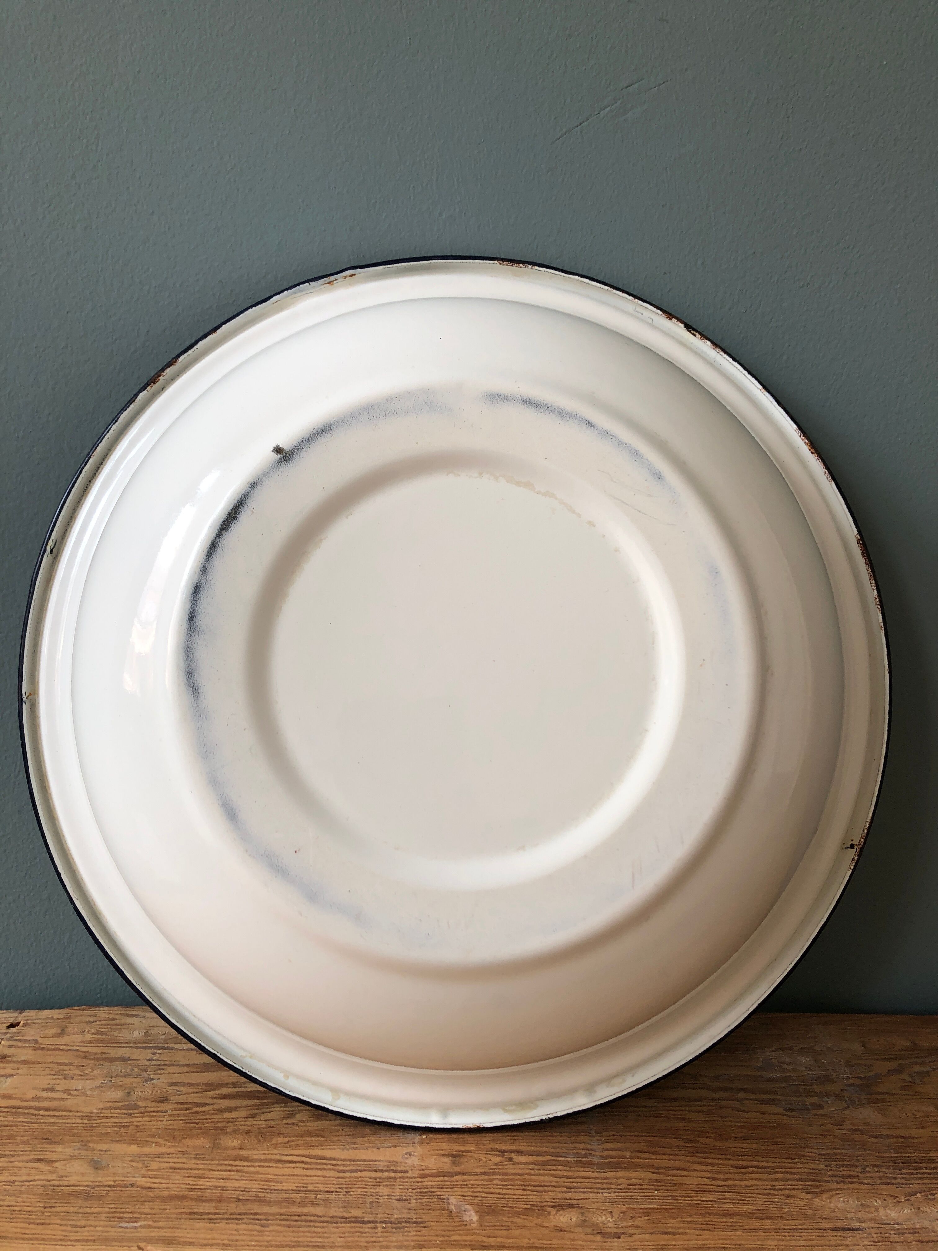 Ancient enamelled sheet metal basin